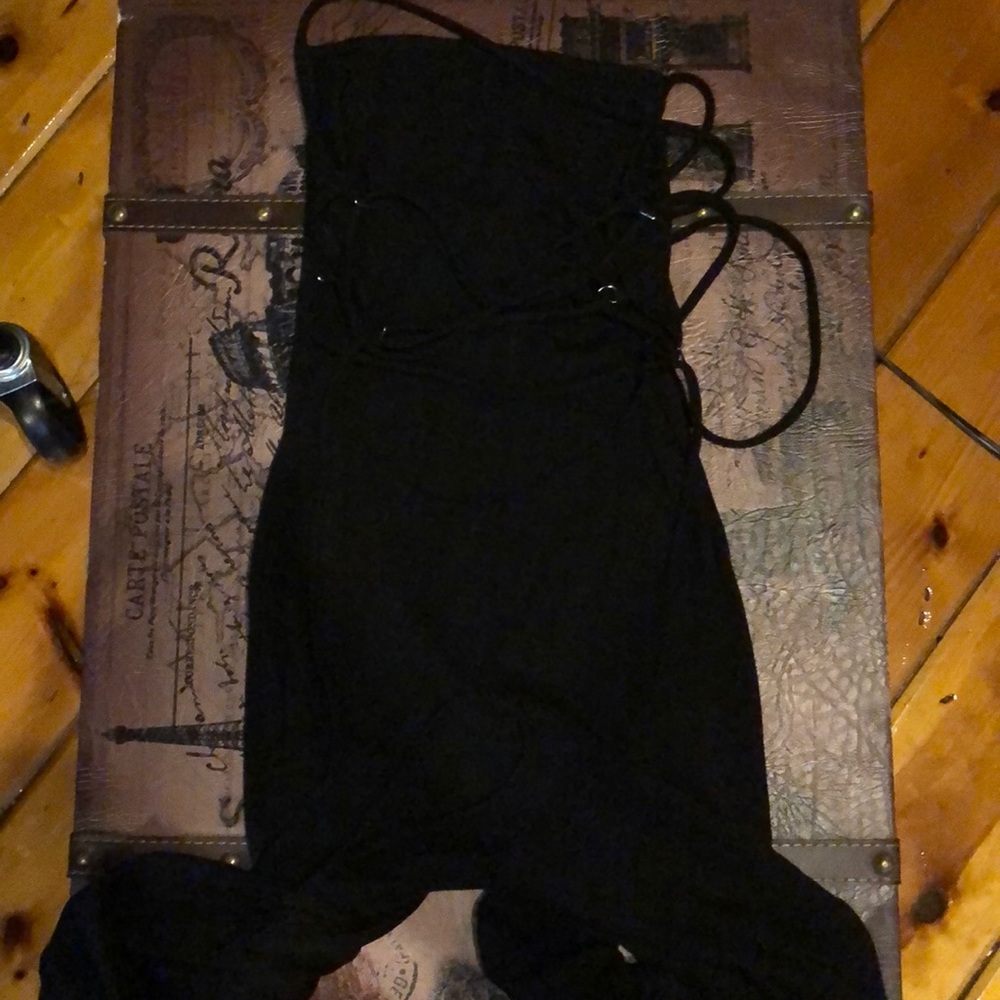 black jumper , open back